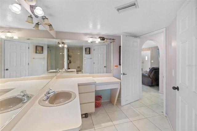 9642 Elgin Blvd, Spring Hill, FL 34606 - bathroom featuring tile patterned floors, vanity, and baseboards