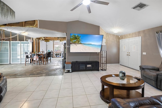 9642 Elgin Blvd, Spring Hill, FL 34606 - living room featuring ceiling fan, lofted ceiling, and light tile patterned floors