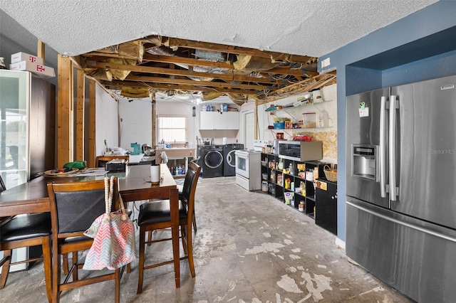 9642 Elgin Blvd, Spring Hill, FL 34606 - dining area with independent washer and dryer and unfinished concrete floors