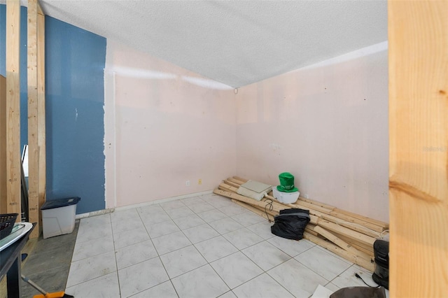 9642 Elgin Blvd, Spring Hill, FL 34606 - tiled spare room featuring a textured ceiling