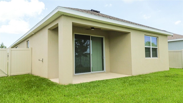 3762 Mossy Limb Ct, Palmetto, FL 34221 - rear view of property with stucco siding, ceiling fan, and roof with shingles