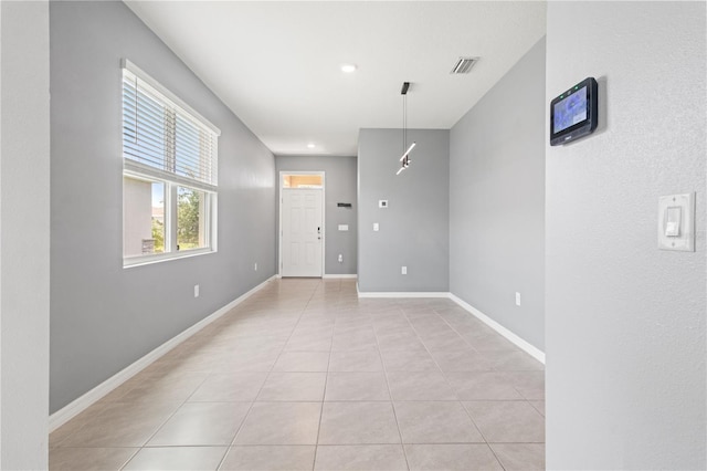3762 Mossy Limb Ct, Palmetto, FL 34221 - unfurnished room with light tile patterned flooring and recessed lighting