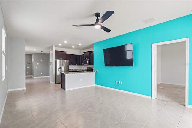 3762 Mossy Limb Ct, Palmetto, FL 34221 - unfurnished living room featuring ceiling fan, recessed lighting, and light tile patterned floors