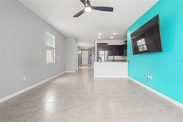 3762 Mossy Limb Ct, Palmetto, FL 34221 - unfurnished living room with a ceiling fan, light tile patterned floors, and recessed lighting