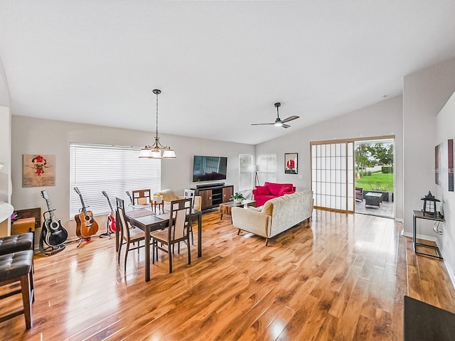1338 Winding Willow Dr, Trinity, FL 34655 - dining space featuring light wood-style floors, vaulted ceiling, and ceiling fan