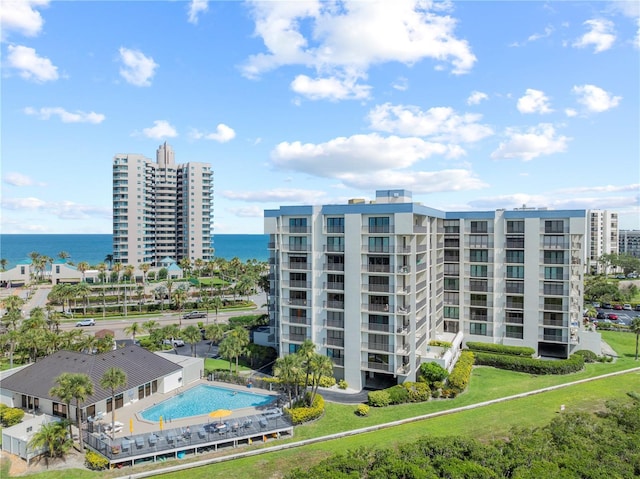 1501 Gulf Blvd Unit 201, Clearwater Beach, FL 33767 - view of apartment building / complex featuring a water view and a community pool