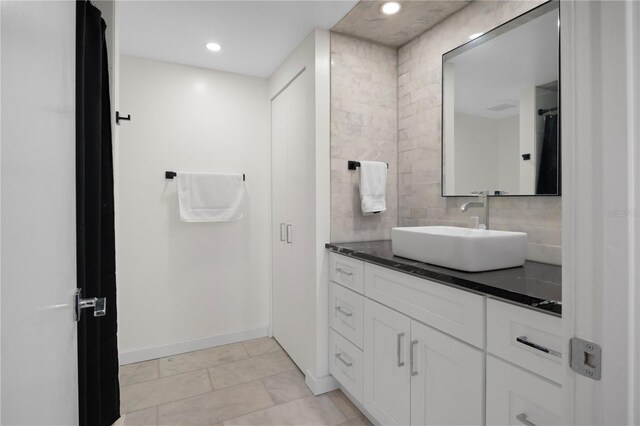 1501 Gulf Blvd Unit 201, Clearwater Beach, FL 33767 - bathroom featuring vanity, decorative backsplash, and recessed lighting