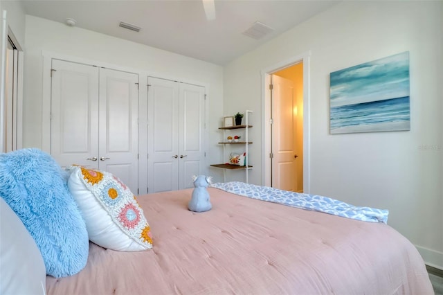 803 Oak Bend Ln, Dunedin, FL 34698 - bedroom with multiple closets and ceiling fan