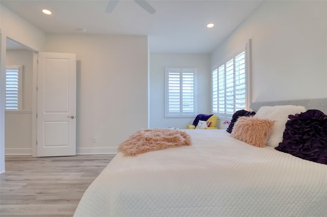 803 Oak Bend Ln, Dunedin, FL 34698 - bedroom featuring light wood-style flooring, recessed lighting, and a ceiling fan