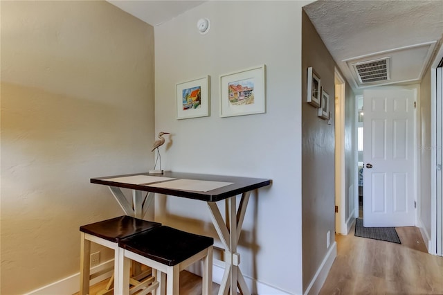 282 Treasure Island Cswy Unit 12, Treasure Island, FL 33706 - hall with wood finished floors and baseboards