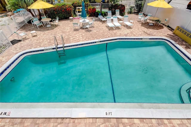 282 Treasure Island Cswy Unit 12, Treasure Island, FL 33706 - community pool with a patio