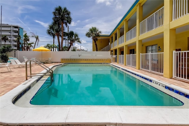 282 Treasure Island Cswy Unit 12, Treasure Island, FL 33706 - community pool featuring a patio area