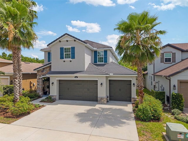 3532 Wicket Field Rd, Lutz, FL 33548 - traditional home featuring stone siding, stucco siding, a tile roof, an attached garage, and concrete driveway