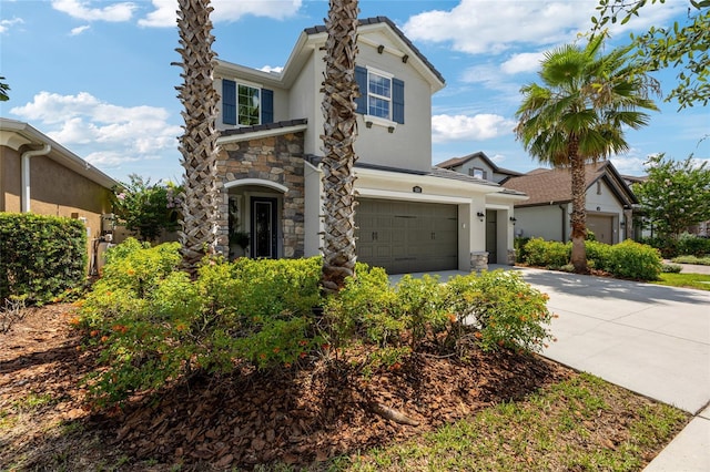3532 Wicket Field Rd, Lutz, FL 33548 - traditional-style house with stone siding, a garage, driveway, and stucco siding
