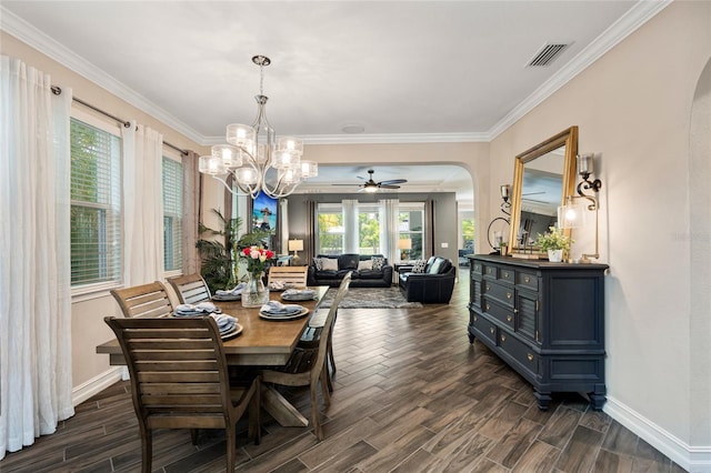 3532 Wicket Field Rd, Lutz, FL 33548 - dining room with arched walkways, a chandelier, dark wood-style floors, and ornamental molding