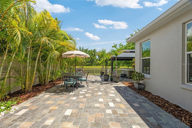 3532 Wicket Field Rd, Lutz, FL 33548 - fenced backyard featuring a gazebo, a patio, and outdoor dining space