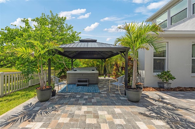 3532 Wicket Field Rd, Lutz, FL 33548 - view of patio / terrace featuring a hot tub and a gazebo