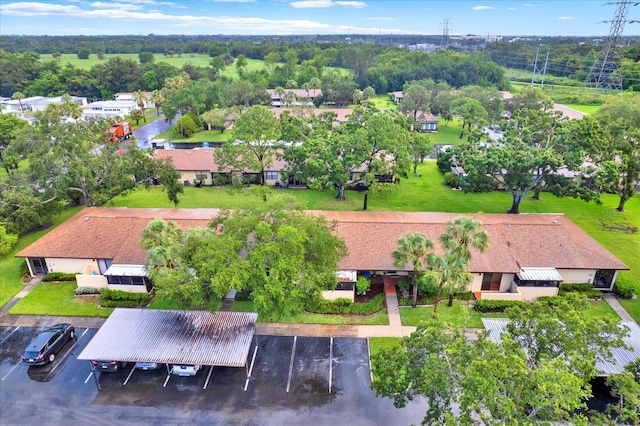 1206 10th Cir SE, Largo, FL 33771 - aerial view of property and surrounding area with a tree filled landscape