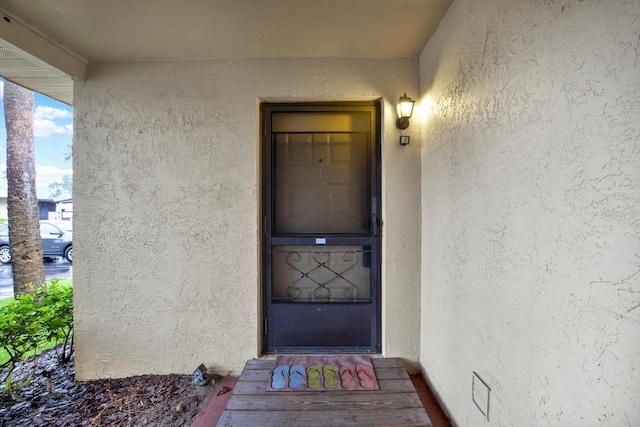 1206 10th Cir SE, Largo, FL 33771 - entrance to property with stucco siding
