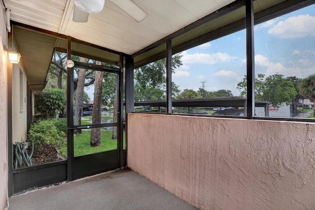 1206 10th Cir SE, Largo, FL 33771 - unfurnished sunroom featuring healthy amount of natural light