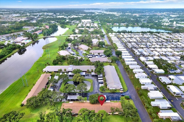 1206 10th Cir SE, Largo, FL 33771 - aerial overview of property's location with a nearby body of water and nearby suburban area