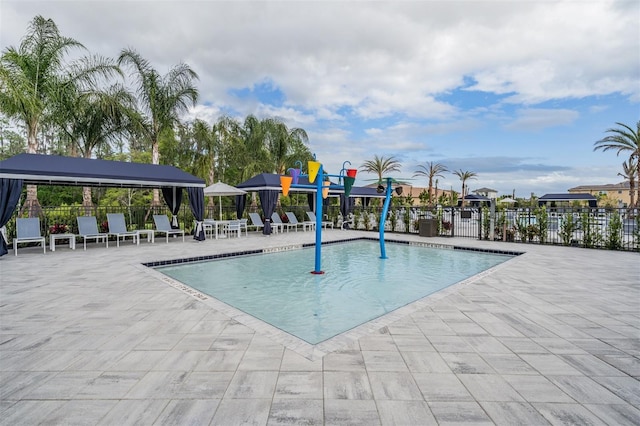3197 Acacia Bay Ave, Wesley Chapel, FL 33543 - community pool featuring a gazebo and a patio