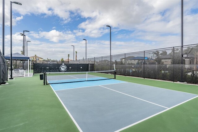 3197 Acacia Bay Ave, Wesley Chapel, FL 33543 - view of tennis court with community basketball court
