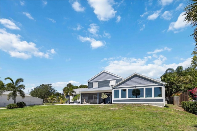 711 N Indian River Dr, Cocoa, FL 32922 - rear view of house with a sunroom