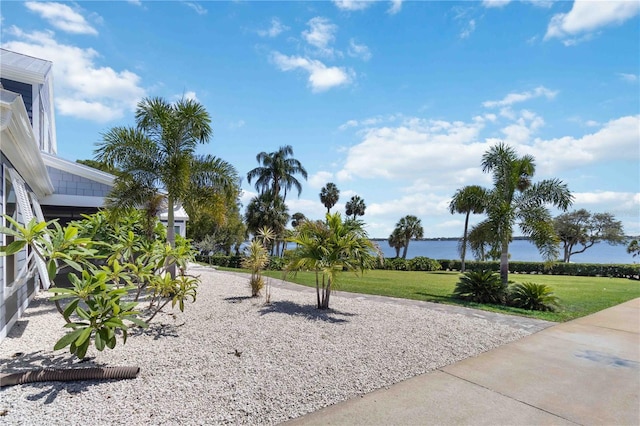 711 N Indian River Dr, Cocoa, FL 32922 - surrounding community with a water view and a yard