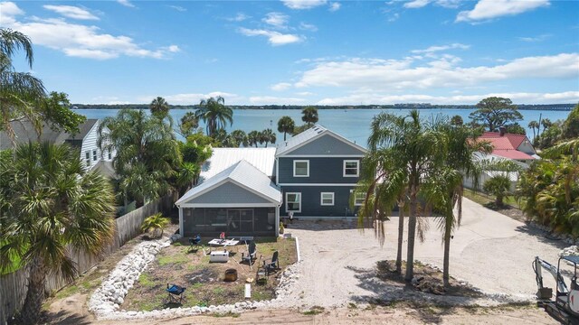 711 N Indian River Dr, Cocoa, FL 32922 - view of front of home featuring a sunroom and a water view