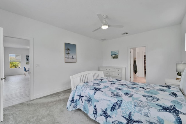 5415 Limelight Dr, Apollo Beach, FL 33572 - bedroom featuring light colored carpet and ceiling fan