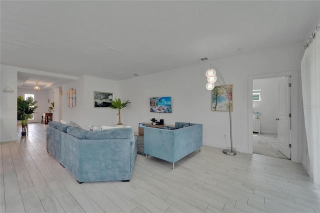 5415 Limelight Dr, Apollo Beach, FL 33572 - living area with light wood finished floors and baseboards
