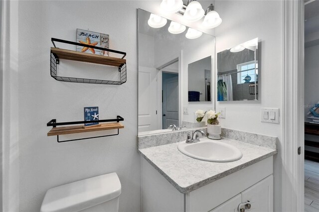 5415 Limelight Dr, Apollo Beach, FL 33572 - bathroom featuring vanity and toilet