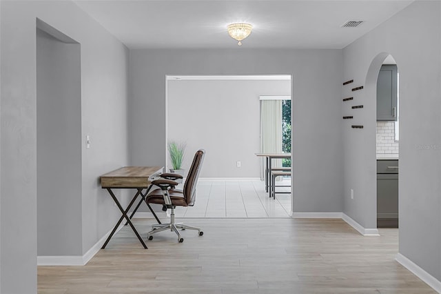 2481 12th Ave SW, Largo, FL 33770 - office space featuring light wood-type flooring and arched walkways