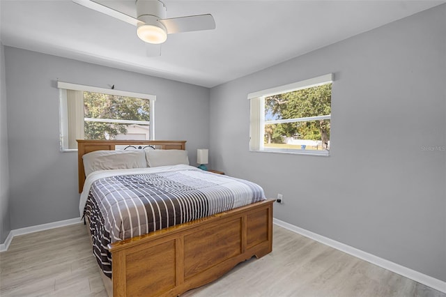 2481 12th Ave SW, Largo, FL 33770 - bedroom featuring light wood-style floors and a ceiling fan