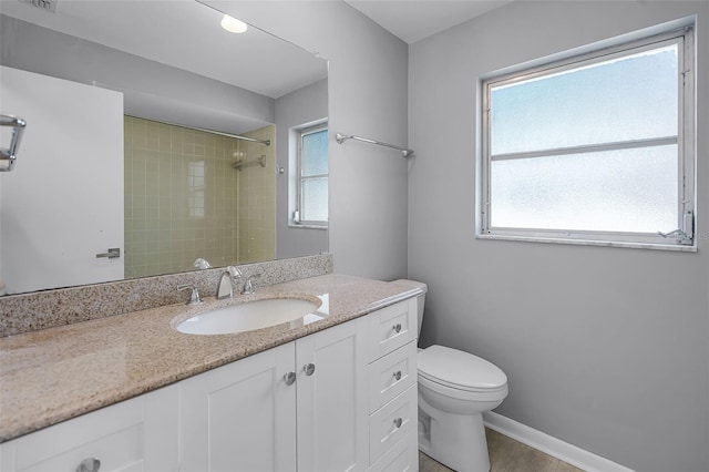 2481 12th Ave SW, Largo, FL 33770 - bathroom featuring vanity, a shower, and wood finished floors