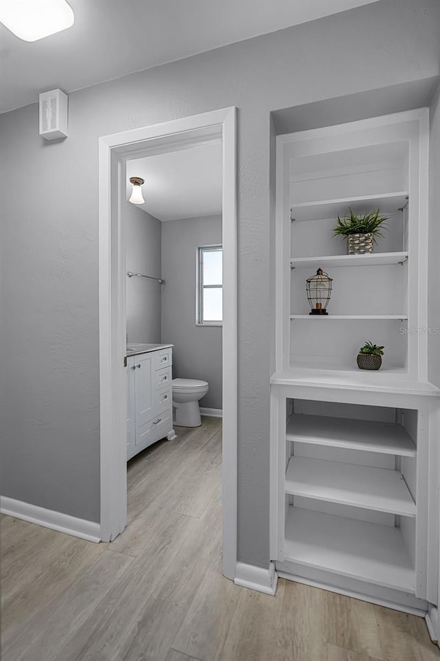 2481 12th Ave SW, Largo, FL 33770 - bathroom featuring vanity and wood finished floors