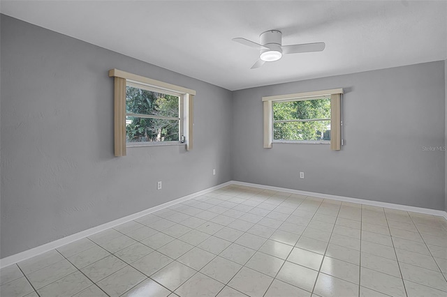 2481 12th Ave SW, Largo, FL 33770 - spare room featuring a ceiling fan and light tile patterned floors
