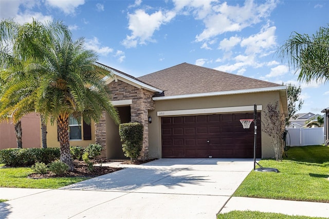 11711 Winterset Cove Dr, Riverview, FL 33579 - view of front of home with an attached garage, stone siding, concrete driveway, and stucco siding
