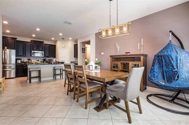 11711 Winterset Cove Dr, Riverview, FL 33579 - dining area with light tile patterned flooring and recessed lighting