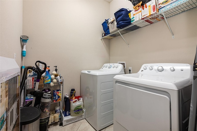11711 Winterset Cove Dr, Riverview, FL 33579 - laundry area with washing machine and dryer and light tile patterned flooring