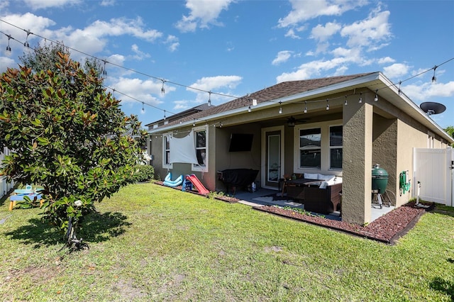 11711 Winterset Cove Dr, Riverview, FL 33579 - back of property with an outdoor hangout area, stucco siding, a patio area, and ceiling fan