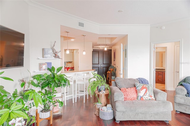 1209 E Cumberland Ave Unit 1003, Tampa, FL 33602 - living room featuring dark wood-type flooring and ornamental molding