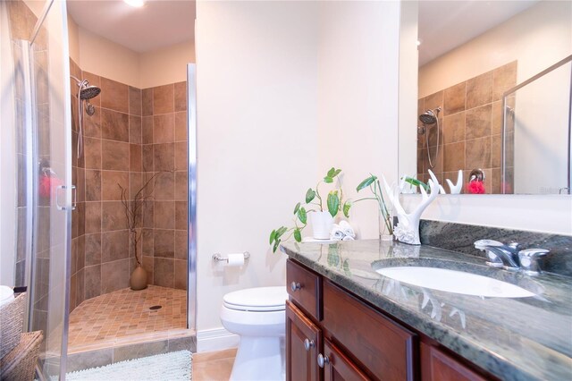 1209 E Cumberland Ave Unit 1003, Tampa, FL 33602 - full bath featuring a shower stall, vanity, and tile patterned flooring