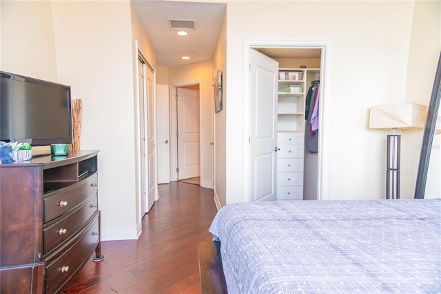 1209 E Cumberland Ave Unit 1003, Tampa, FL 33602 - bedroom with dark wood-style flooring, a closet, and recessed lighting