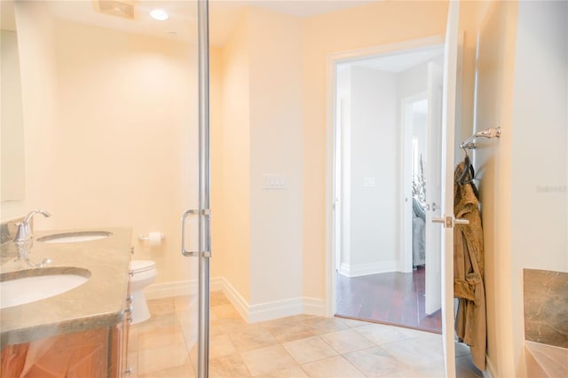1209 E Cumberland Ave Unit 1003, Tampa, FL 33602 - full bathroom featuring double vanity, tile patterned floors, and a stall shower