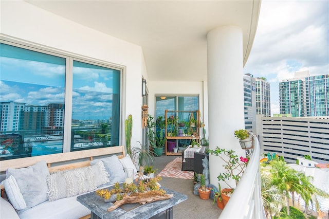 1209 E Cumberland Ave Unit 1003, Tampa, FL 33602 - balcony with a view of city and an outdoor living space