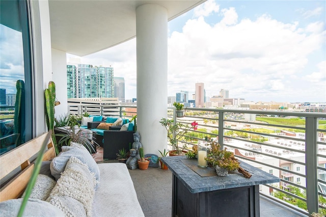 1209 E Cumberland Ave Unit 1003, Tampa, FL 33602 - balcony featuring a view of city and an outdoor hangout area