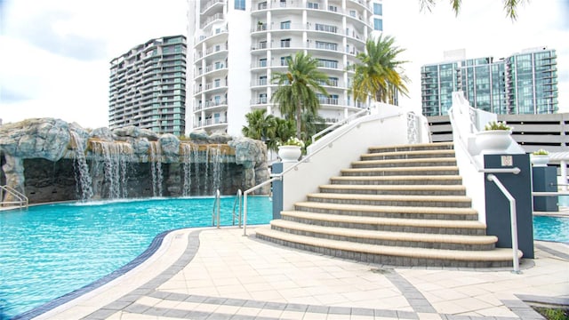 1209 E Cumberland Ave Unit 1003, Tampa, FL 33602 - community pool featuring stairs