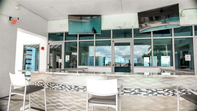 1209 E Cumberland Ave Unit 1003, Tampa, FL 33602 - view of patio with an outdoor bar